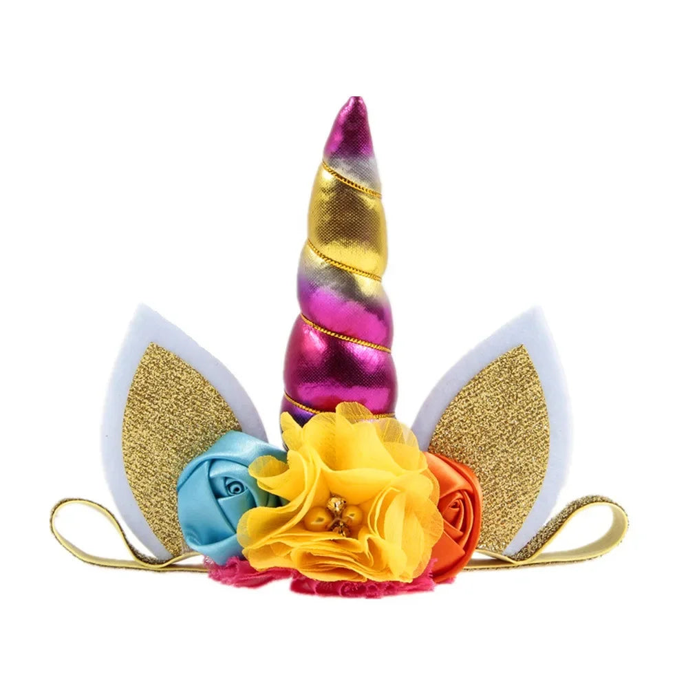 Colorful unicorn horn and ears headband with flowers on a white background