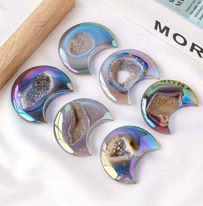 Iridescent half-circle coasters with natural stone centers on a white surface.