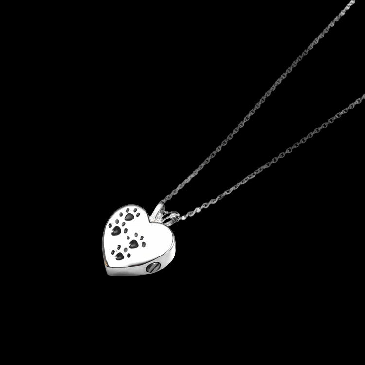 Silver heart-shaped pendant necklace on a white background