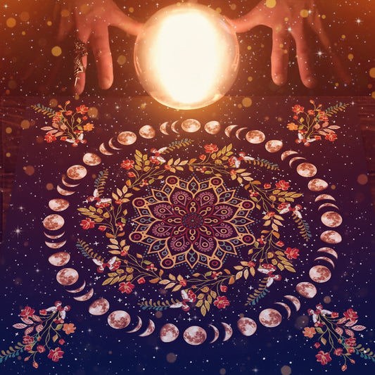 Mandala design with moon phases and hands holding a glowing crystal ball on a dark background