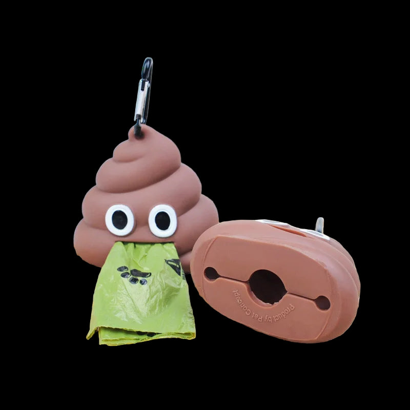 Two brown poop-shaped products with a green bag on a woven surface.
