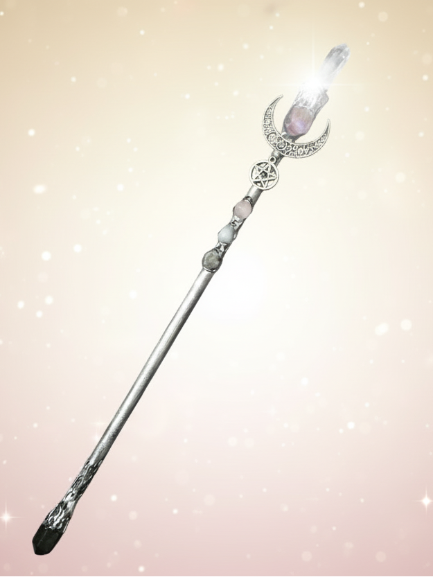 Decorative hair stick with crystals on a textured gray surface