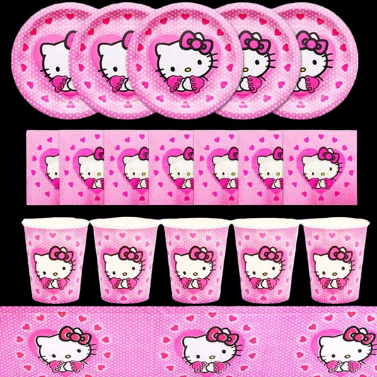 Hello Kitty-themed party supplies including plates, cups, and tablecloth on a pink background.