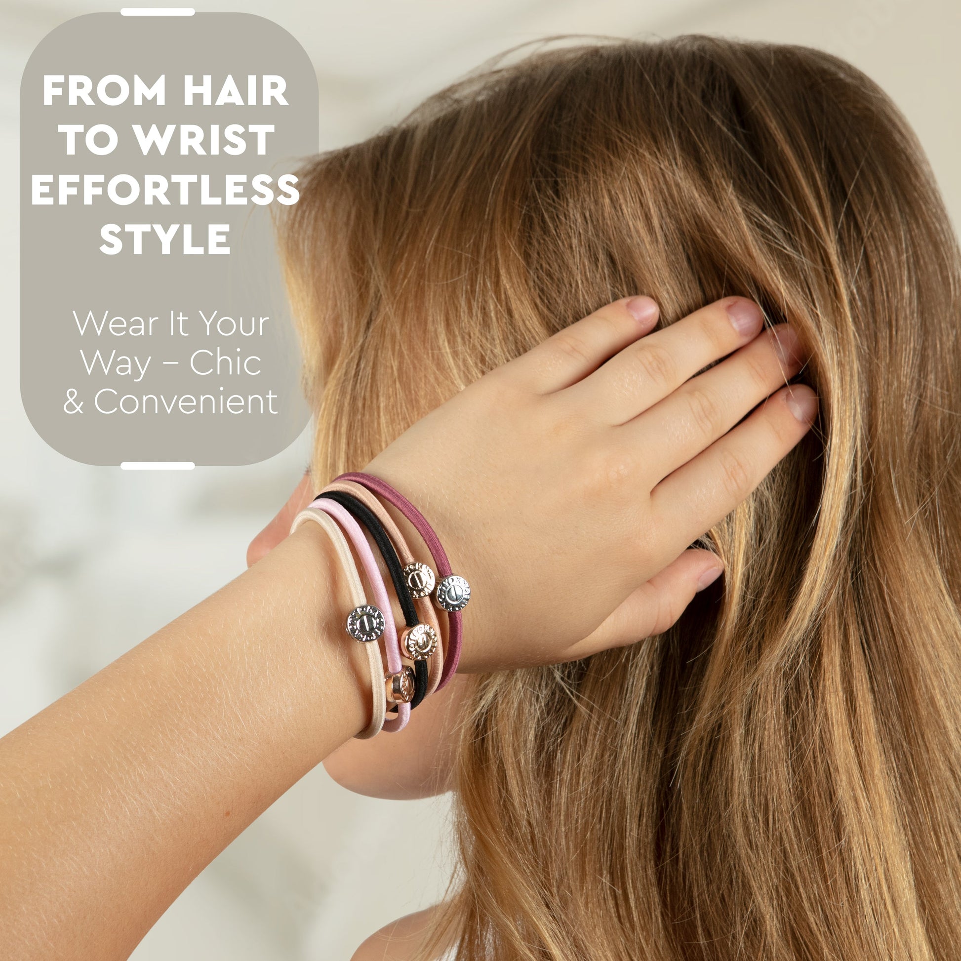 Person wearing multiple bracelets on wrist with text 'From Hair to Wrist Effortless Style' on a neutral background