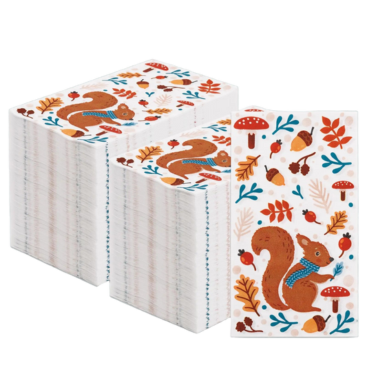 Stack of paper napkins with autumn-themed design featuring squirrels and leaves on a white background.