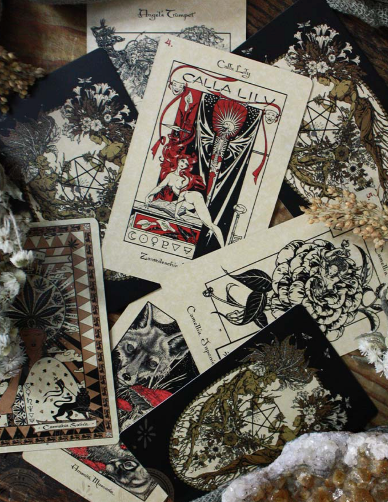 Collection of tarot cards with intricate designs on a textured surface.