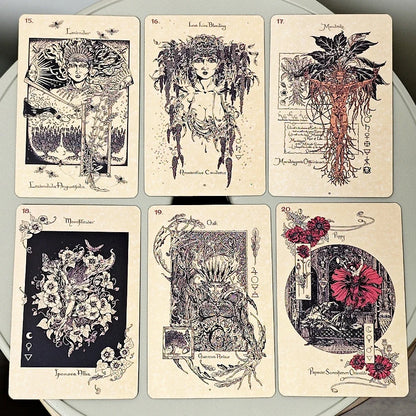 Set of six tarot cards with intricate designs on a circular surface.