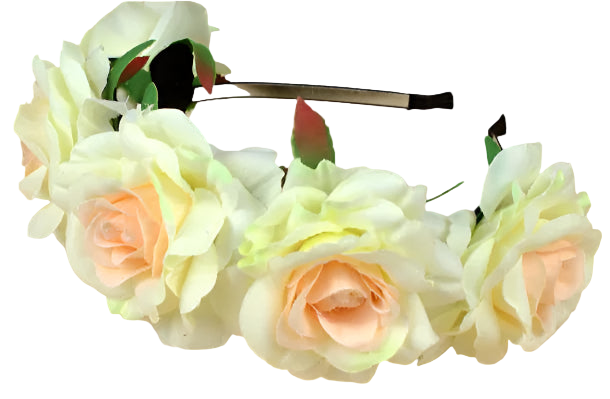 Floral headband with artificial flowers on a wooden surface