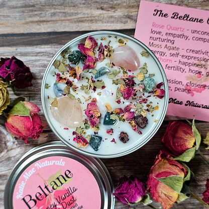 Beltane Naturals product with rose quartz and moss agate on a wooden surface