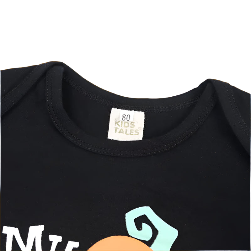 Black shirt with a logo and '80 Kids Tales' label on a white background