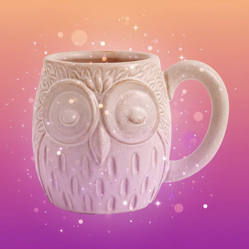 White ceramic owl mug on a white background