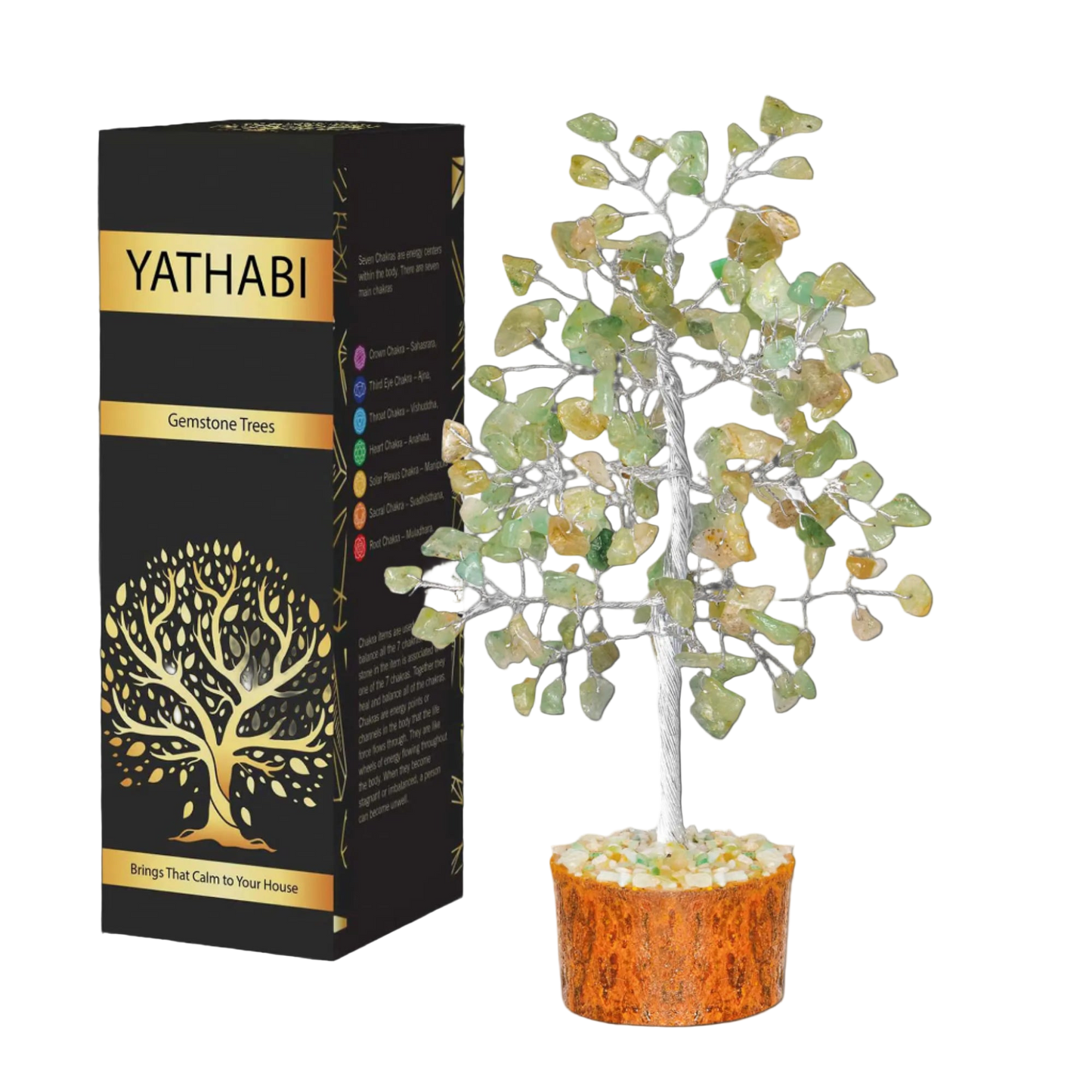 Yathabi gemstone tree next to its packaging on a white background