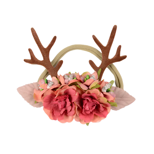 Floral headband with antlers and pink flowers on a white background