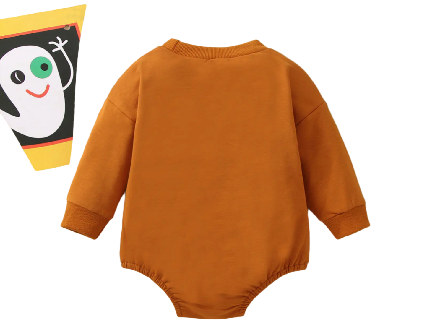 Brown baby onesie on a beige background with Halloween-themed decorations.