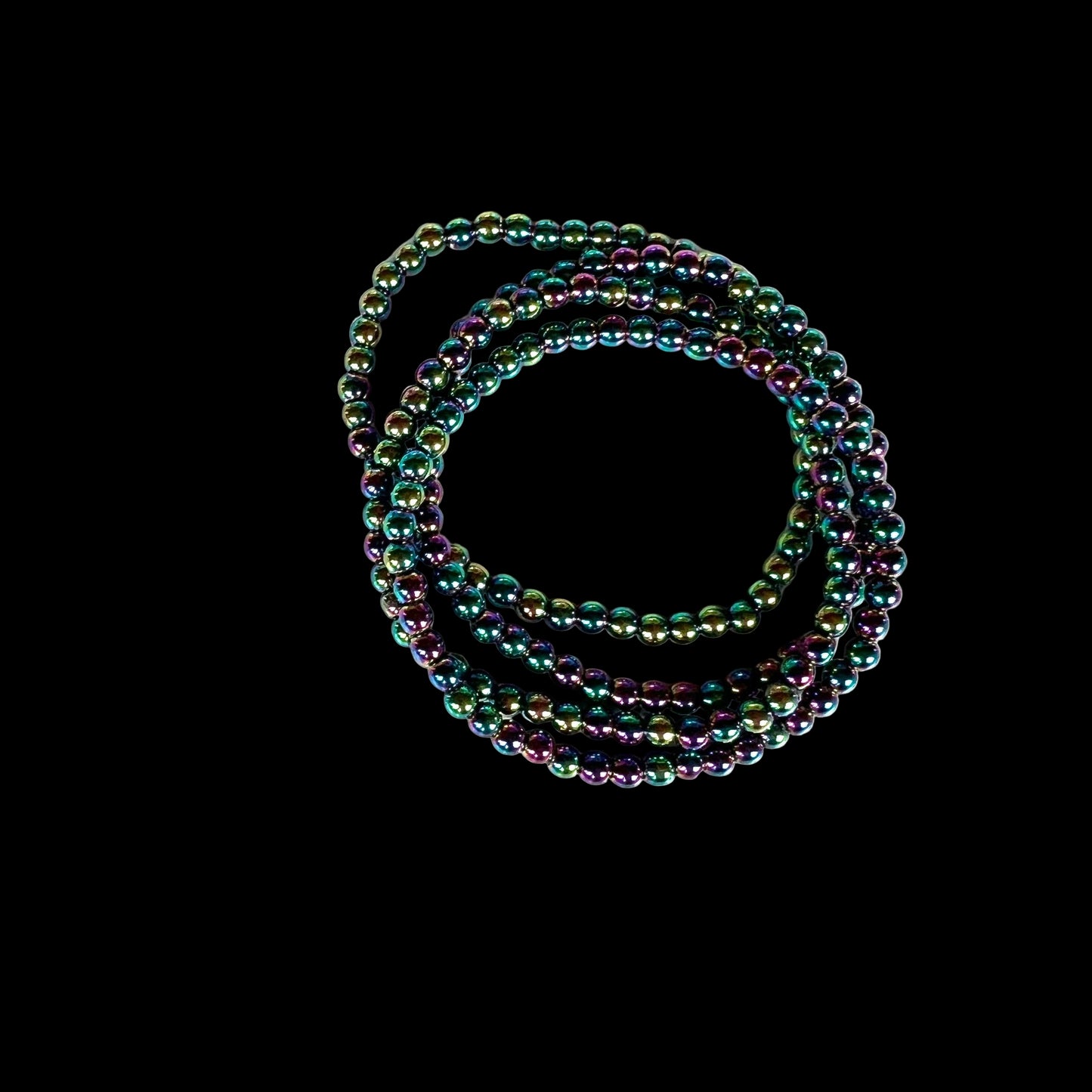 Multicolored beaded bracelets on a white background