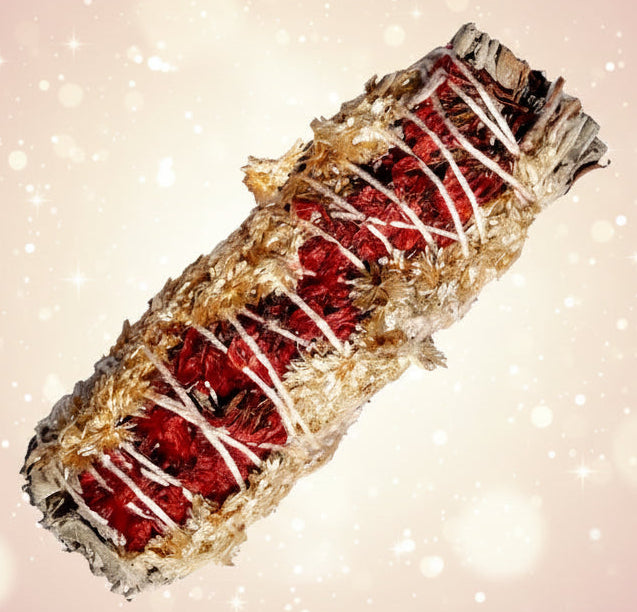 Cone-shaped product with red center and white drizzle on a white background