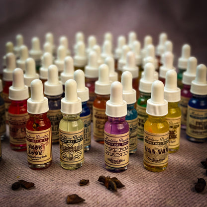 Collection of small bottles with droppers on a textured surface