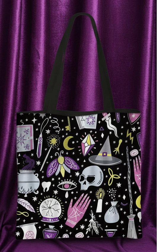 Tote bag with black background and colorful witch-themed design on front and back