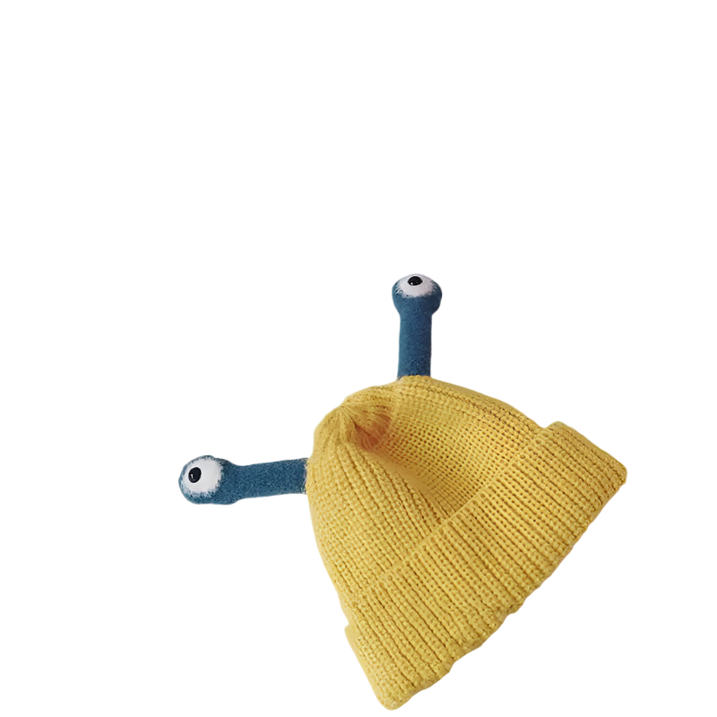 Yellow knit hat with blue arms and eyes on a white background