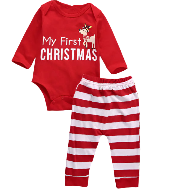 Red 'My First Christmas' baby outfit with striped pants on a wooden surface.