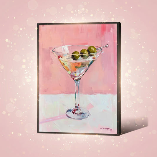 Framed artwork of a martini glass with olives on a pink and white abstract background