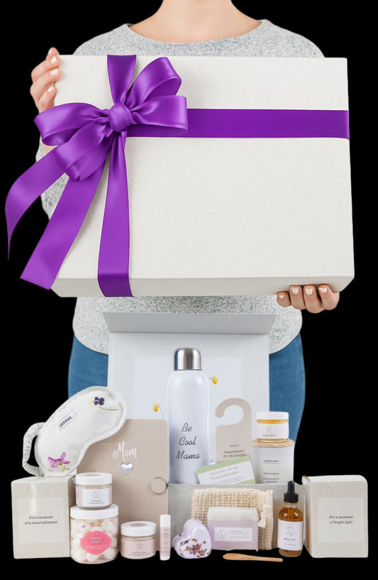 White gift box with a purple ribbon held by a person, surrounded by various beauty products on a white background.