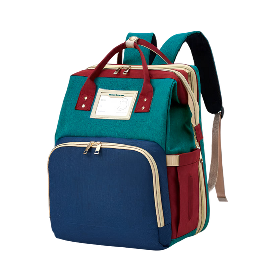 Multicolored backpack with teal, blue, and red sections on a white background