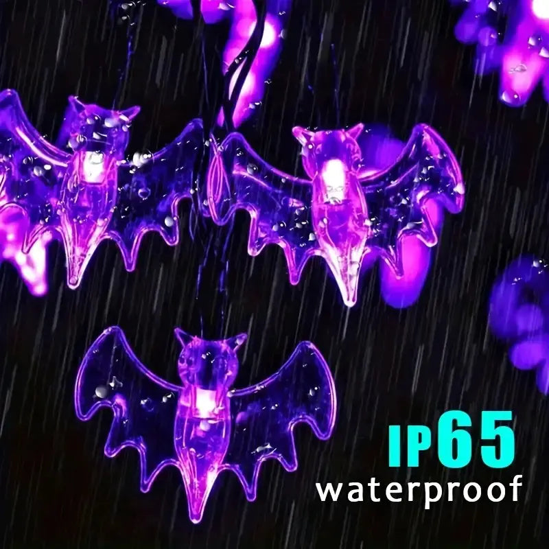 Purple bat-shaped LED lights on a dark background with 'IP65 waterproof' text.