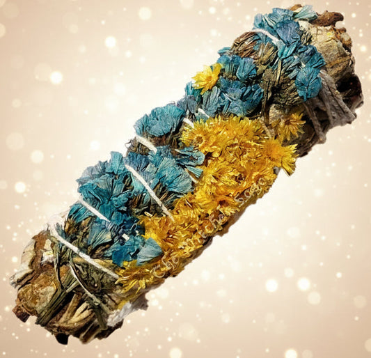 Bundled sage with blue and yellow elements on a white background
