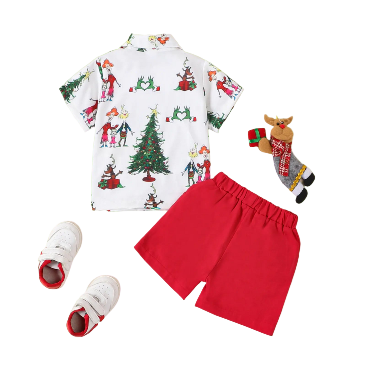 Children's Christmas-themed outfit with shirt, shorts, and shoes on a beige background.