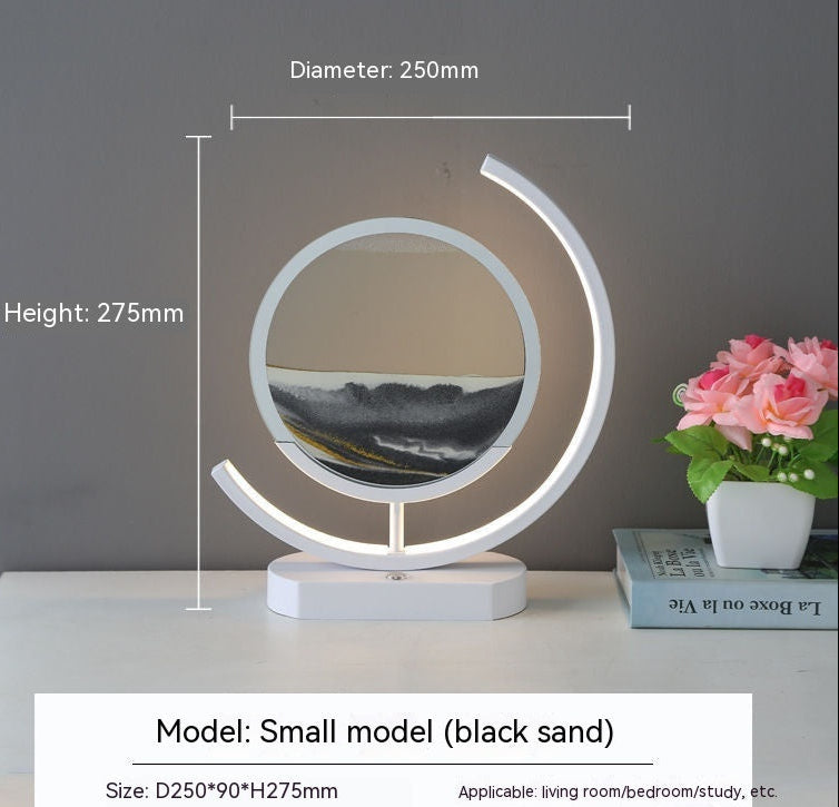 Small model of a round decorative piece with dimensions on a table.