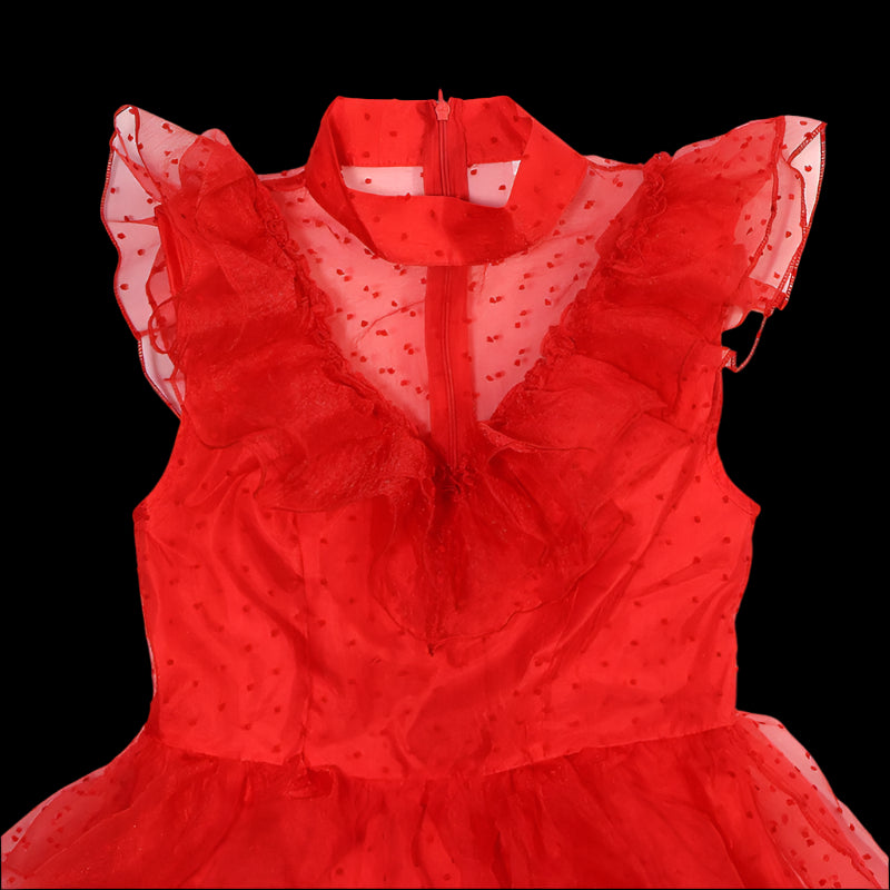 Red dress with sheer overlay on a white background