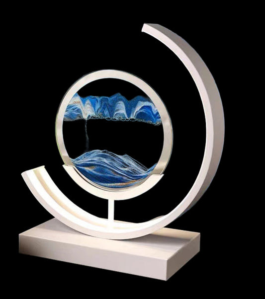 Decorative lamp with water art design on a dark surface with a blue background