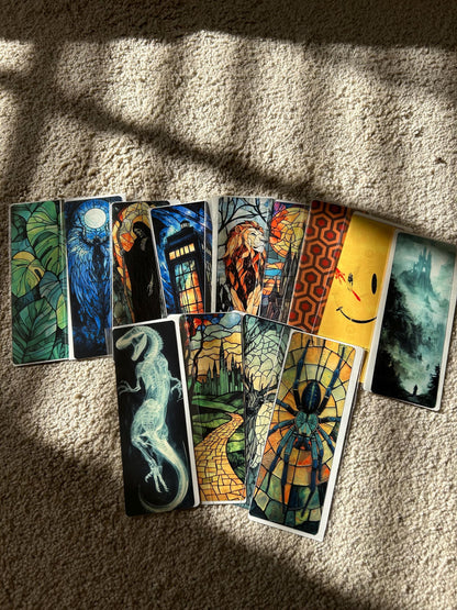 Collection of colorful tarot cards on a textured surface