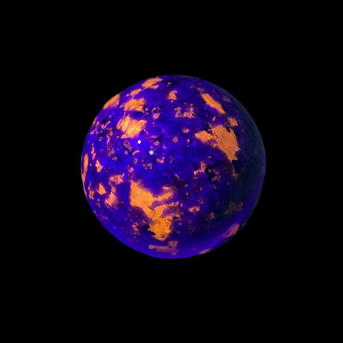 Purple and orange spherical object on a white background