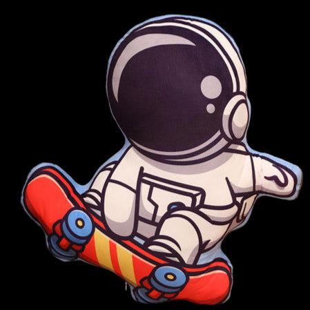 Decorative pillow with an astronaut design on a couch