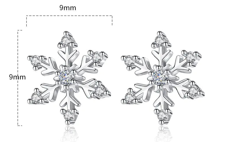 Snowflake-shaped earrings with measurements and weight on a white background