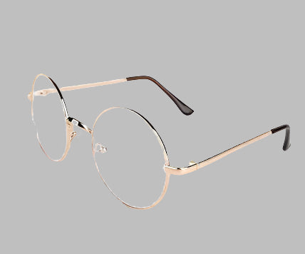 Gold-framed eyeglasses on a white background