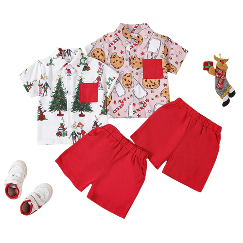 Children's Christmas-themed shirt with tree and reindeer design, red shorts, and white sneakers on a beige background.