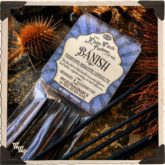 Packaged incense sticks with a label on a textured background