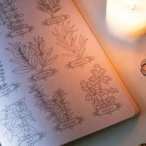 Notebook with floral illustrations on a soft focus background
