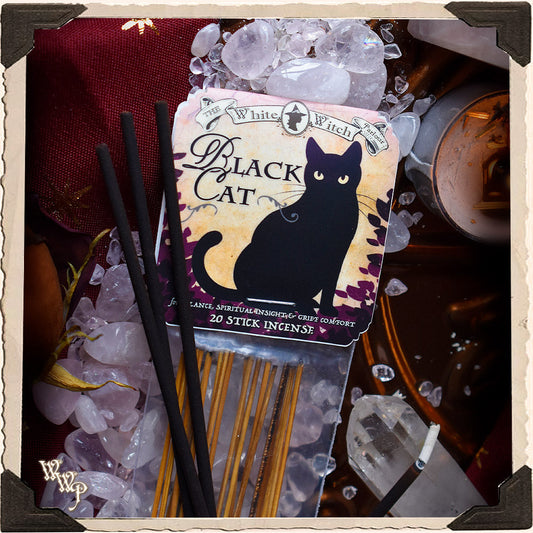 Black Cat incense sticks packaging with decorative background