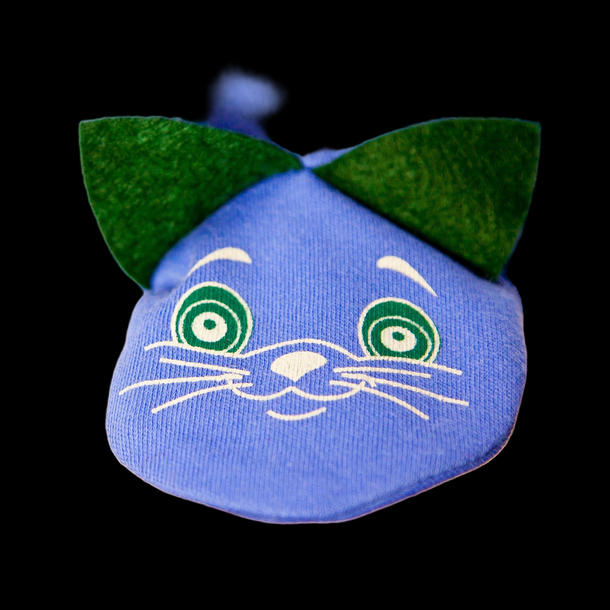 Blue cat-shaped sock with green ears and white face details on a white background