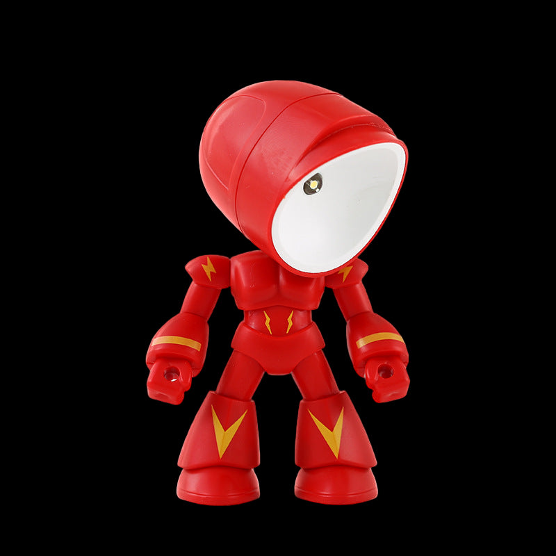 Red robot toy with yellow accents on a pink background