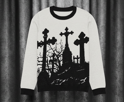Sweater with black silhouette design of a cemetery on a white background