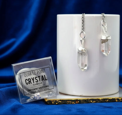 Crystal point earrings with packaging on a white surface