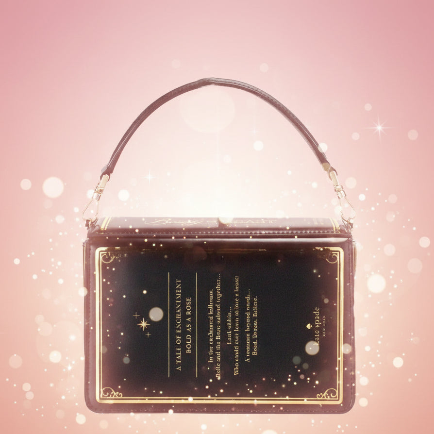 Black handbag with gold accents and text on a white background