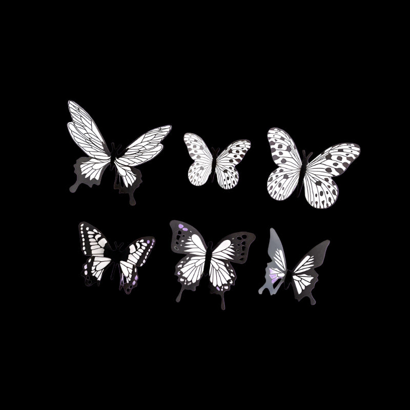 Set of six butterfly silhouettes on a white background