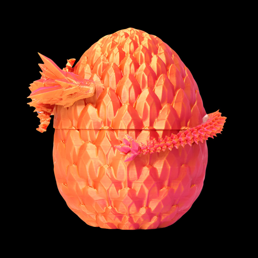 Colorful dragon egg-shaped container with a textured surface on a white background