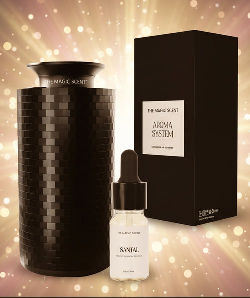 Black and white Aroma System product with packaging on a white background